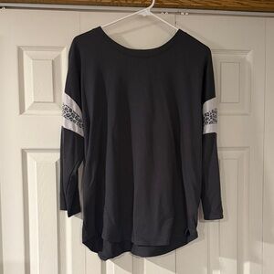 Stylish Black Top with White Leopard Print Accents